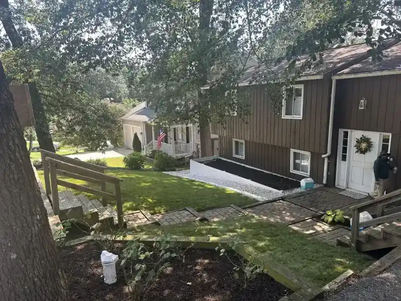 Clean mulch beds after hillside cleanup